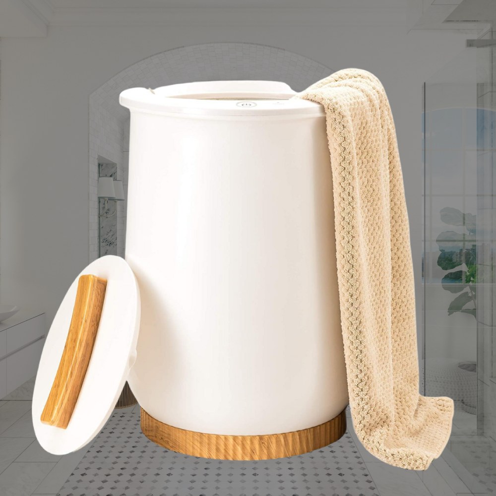 A white bucket towel warmer with a towel draped over it